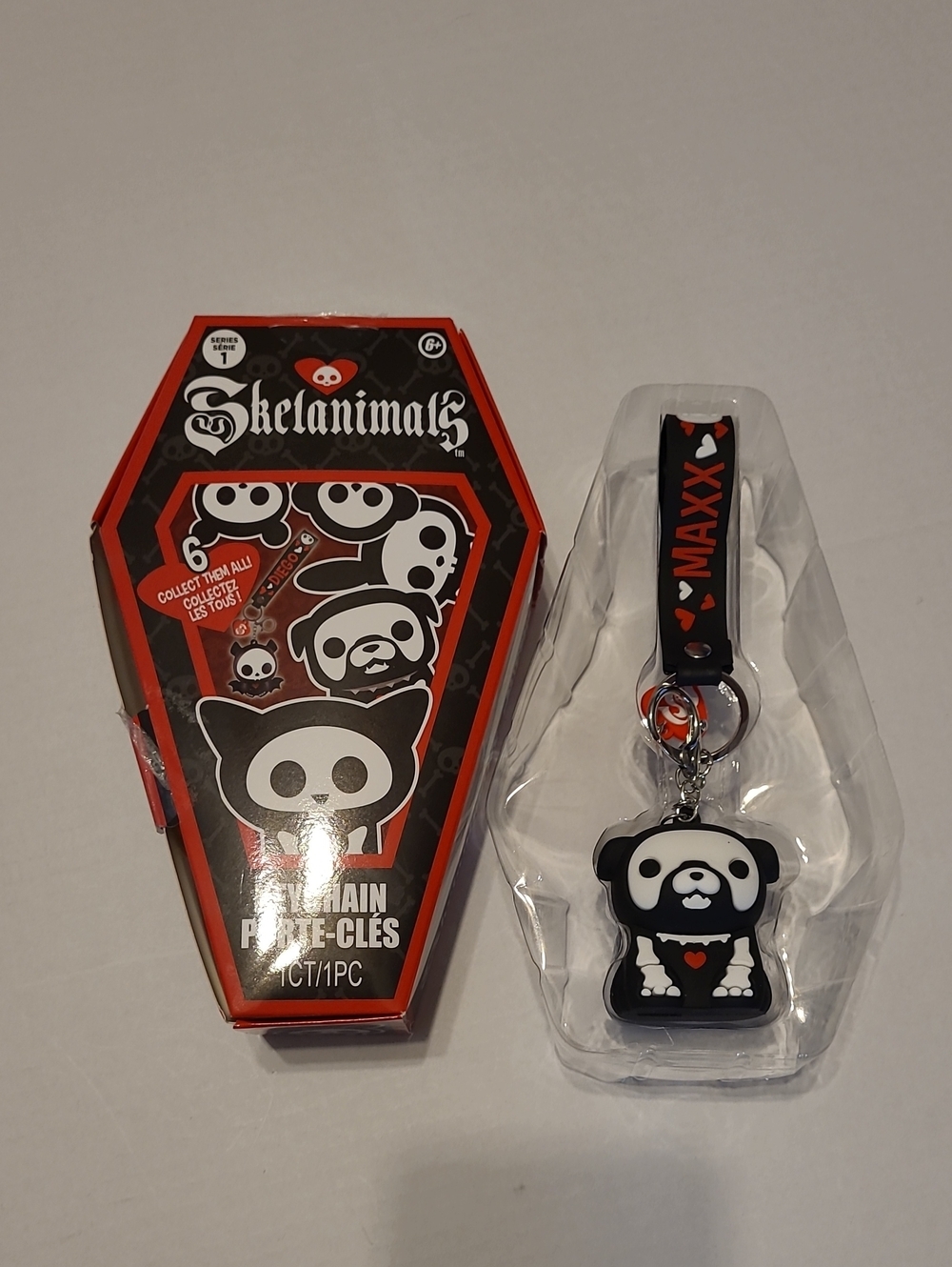 Skelanimals Series 1 collectible figural keychain featuring Maxx the Bulldog